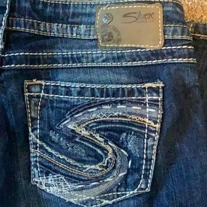 Silver low-rise bootleg jeans